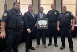 Oskaloosa Police Department received the prestigious FBI-LEEDA Agency Trilogy Award from COO Michael Robinson Sr. at the Oskaloosa City Council meeting recently. This honor, awarded to fewer than 150 agencies nationwide, recognizes the department's commitment to excellence through nationally renowned training. The department expressed deep gratitude to the Council for supporting their ongoing efforts in recruitment, retention, and staying current with best practices. (photo OPD Facebook page)