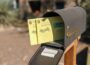 Absentee ballots in a mailbox. (Photo by Jim Small/Arizona Mirror)