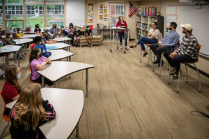 Fourth graders listen to guest speakers at Moore Elementary in Des Moines, Iowa. (Photo courtesy of Phil Roeder/Des Moines Public Schools)