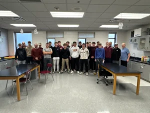The Oskaloosa High School baseball team and coaches gather this morning as Vaughn Blythe from Musco Lighting shares an unforgettable announcement—this spring, the team will play on the legendary Wrigley Field! ⚾ This once-in-a-lifetime opportunity continues Osky’s tradition of building strong athletes and even stronger leaders. #OskyBuildsLeaders #ALLIN