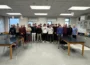 The Oskaloosa High School baseball team and coaches gather this morning as Vaughn Blythe from Musco Lighting shares an unforgettable announcement—this spring, the team will play on the legendary Wrigley Field! ⚾ This once-in-a-lifetime opportunity continues Osky’s tradition of building strong athletes and even stronger leaders. #OskyBuildsLeaders #ALLIN