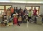 Volunteers from Outer Limits Truck Repair and The Climb gather for a group photo at Beacon United Methodist Church after moving hundreds of donated shoes, hygiene items, and supplies in preparation for the upcoming “Shoe’s and Do’s” back-to-school event. (submitted photo)