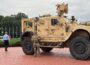 A member of the National Guard stands alongside a military vehicle parked in front of Union Station, near the U.S. Capitol in Washington, D.C., on Aug. 18, 2025. (Photo by Jane Norman/States Newsroom)