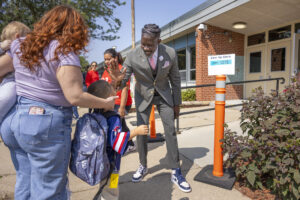  Des Moines Public Schools Superintendent Dr. Ian Andre Roberts was part of the group welcoming students and families to their first day of preschool at Mitchell Early Learning Center in Des Moines on Sept. 6, 2025. (Photo courtesy Jon Lemons/Des Moines Public Schools)