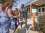 Des Moines Public Schools Superintendent Dr. Ian Andre Roberts was part of the group welcoming students and families to their first day of preschool at Mitchell Early Learning Center in Des Moines on Sept. 6, 2025. (Photo courtesy Jon Lemons/Des Moines Public Schools)