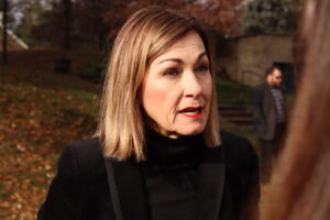 Gov. Kim Reynolds speaks with reporters outside of Terrace Hill in Des Moines Nov. 25, 2025. (Photo by Cami Koons/Iowa Capital Dispatch)