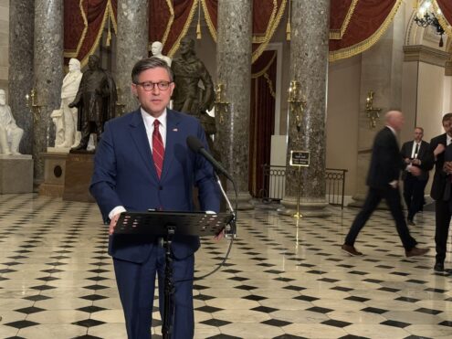 House Speaker Mike Johnson, R-La., talks with reporters inside Statuary Hall in the U.S. Capitol building on Wednesday, Nov. 12, 2025. (Photo by Jennifer Shutt/States Newsroom)