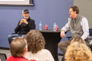 Kyle Petty (left) and Jeff Rogers (right) discusss the upcoming charity ride founded by Petty to honor his late son Adam.