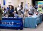 Recruiters discuss jobs with students at a July 2024 jobs fair at St. Edward’s University in Austin, Texas. A new jobs report shows jobs nationwide rebounded after October losses, with a 64,000 gain in November. (Photo courtesy of St. Edward’s University)