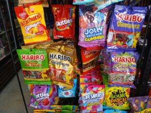 Many candies contain Red No. 40, Yellow No. 5 and Yellow No. 6. They are among the food dyes banned in West Virginia by a measure signed into law in March. Such bans are just one example of how the “Make America Healthy Again” movement has made inroads in state legislatures. (Photo by Carol Johnson/Stateline)