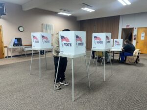  Voters cast their ballots on Nov. 5, 2024 at First Christian Church in Perry, Iowa. (Photo by Brooklyn Draisey/Iowa Capital Dispatch)