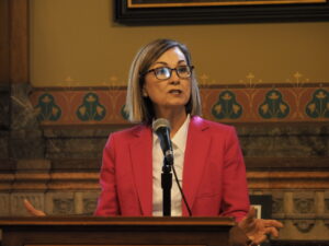  Gov. Kim Reynolds answered questions from reporters at a media availability Feb. 26, 2026. (Photo by Robin Opsahl/Iowa Capital Dispatch)