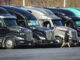Tractor trailers sit parked in a row at a truck stop in Bloomsbury, N.J. (Dana DiFilippo/New Jersey Monitor)