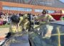 Oskaloosa High School students and community first responders participate in a mock crash demonstration on campus, illustrating the real-life consequences of distracted driving ahead of graduation. 