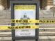 Police tape covers the sign at the visitor's entrance to the State Capitol, which was closed to the public on March 17, 2020, due to the COVID-19 pandemic. Six years later, lawmakers working to limit the governor's ability to order a variety of emergency measures during a public health crisis or other disaster. (Photo by Kathie Obradovich/Iowa Capital Dispatch)