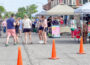 Shoppers browse vendor booths during the opening weekend of the Oskaloosa Farmers Market on the downtown square Saturday morning. The market features locally grown produce, baked goods, handmade crafts, plants and other homemade items from area vendors throughout the summer season.