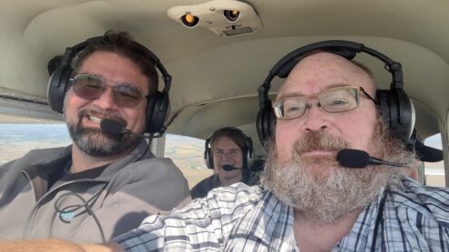 From left to right, Jeff and Elizabeth Jorgensen, and Ken Allsup with Oskaloosa News on a recent flight over Pella and Oskaloosa Iowa.