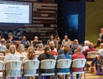 Community members engage in panel discussion at Cancer in Iowa: 99 Counties Project event