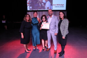 Joe Milledge was honored with Oskaloosa’s Leadership Award for his outstanding contributions to the local Main Street program.