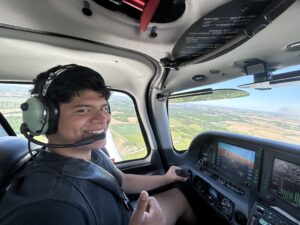 Oskaloosa High School students take in the view from above during a May Term Discovery Flight on May 26 at Pella Municipal Airport. Students flew with Classic Aviation flight instructors, learned about aircraft operations, and had the opportunity to help pilot a small airplane.