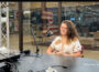 Aleksandra Nagorna speaks during an interview with Oskaloosa News inside the Oskaloosa News studio. The Oskaloosa High School graduate has built a career as a composer, musician, educator, and film scorer, recently earning recognition for her work on the award-winning film "Jury of Her Peers." Nagorna discussed her journey from growing up in Oskaloosa to composing music for films, theater productions, and orchestras across Iowa.