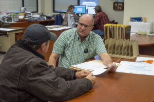  A report shows that the nation lost 8% of Farm Service Agency county staff and 23% of Natural Resources Conservation Service staff in 2025. These staff, pictured here at a Carroll County Maryland office, work directly with farmers. (Photo by Preston Keres/USDA)