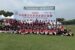 Youth softball players from Iowa and China gather for a group photo during the 2025 China-USA Youth Softball Exchange in Shanghai, China. The 2025 event marked the beginning of the Musco Youth Sports Exchange program. Photo courtesy of Musco.