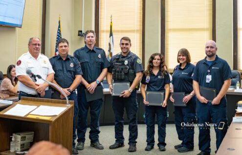 Seven first responders were honored during the Aug. 3, 2026, Oskaloosa City Council meeting. The firefighters, police officer, and Mahaska Health paramedics received American Heart Association Heartsaver Hero Awards for helping save a man who collapsed at the Oskaloosa Public Library on June 2.
