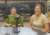 Lilia Morris and Carrie Bihn seated behind microphones during an Oskaloosa News interview about The Hub.