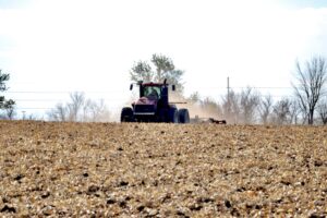  A farmer tills a harvested corn field in late October, 2024 near Boone. (Photo by Cami Koons/Iowa Capital Dispatch)