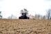 A farmer tills a harvested corn field in late October, 2024 near Boone. (Photo by Cami Koons/Iowa Capital Dispatch)