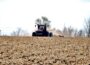 A farmer tills a harvested corn field in late October, 2024 near Boone. (Photo by Cami Koons/Iowa Capital Dispatch)