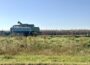 Corn harvest near Prairie City, Iowa along Highway 163 on Oct. 6, 2026. (Photo by Cami Koons/Iowa Capital Dispatch)
