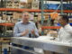 U.S. Environmental Protection Agency Administrator Lee Zeldin, left, spoke with Albert Marasco, CEO of Summit Products on a tour of the Summit Products manufacturing facility in Altoona Oct. 11, 2026. (Photo by Robin Opsahl/Iowa Capital Dispatch)